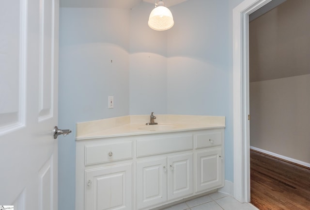 bathroom featuring tile patterned floors and vanity