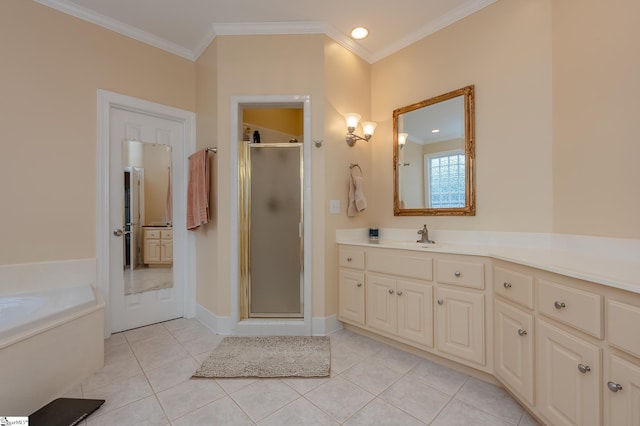 bathroom with a stall shower, ornamental molding, a garden tub, tile patterned flooring, and vanity