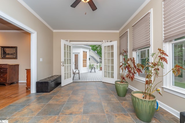 doorway featuring ornamental molding, ceiling fan, french doors, and baseboards