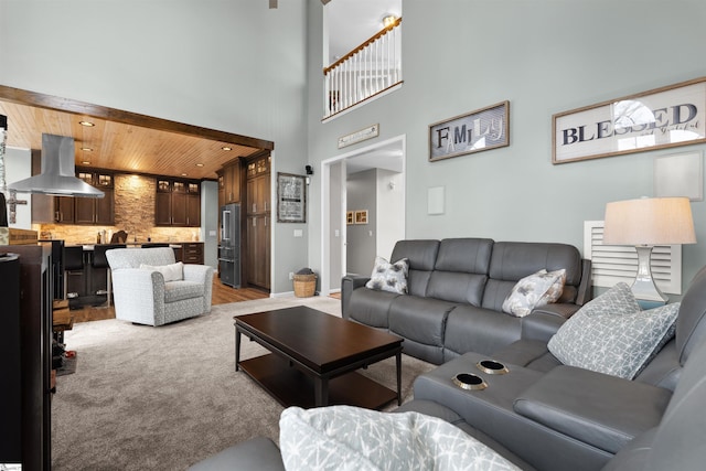 103 Hornbuckle Dr, Easley, SC 29642 - living area featuring a high ceiling, wooden ceiling, and light colored carpet