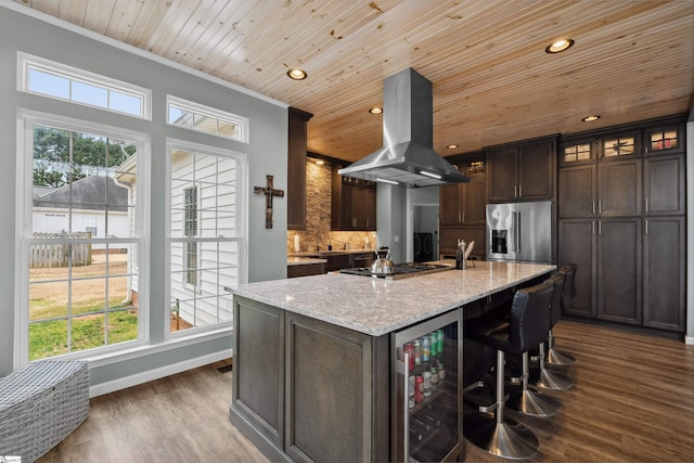103 Hornbuckle Dr, Easley, SC 29642 - kitchen featuring wine cooler, island range hood, appliances with stainless steel finishes, and dark wood-style flooring