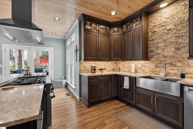 103 Hornbuckle Dr, Easley, SC 29642 - kitchen featuring french doors, decorative backsplash, appliances with stainless steel finishes, a sink, and ventilation hood