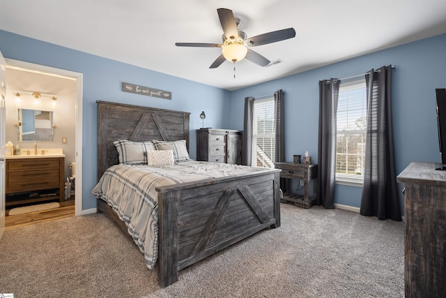 103 Hornbuckle Dr, Easley, SC 29642 - bedroom with carpet floors, a ceiling fan, baseboards, and ensuite bathroom