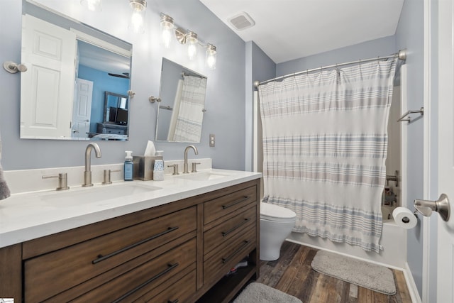 103 Hornbuckle Dr, Easley, SC 29642 - full bathroom featuring visible vents, a sink, toilet, and wood finished floors
