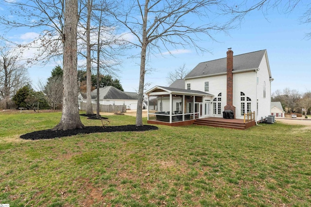 103 Hornbuckle Dr, Easley, SC 29642 - back of house with a sunroom, a wooden deck, a chimney, and a yard