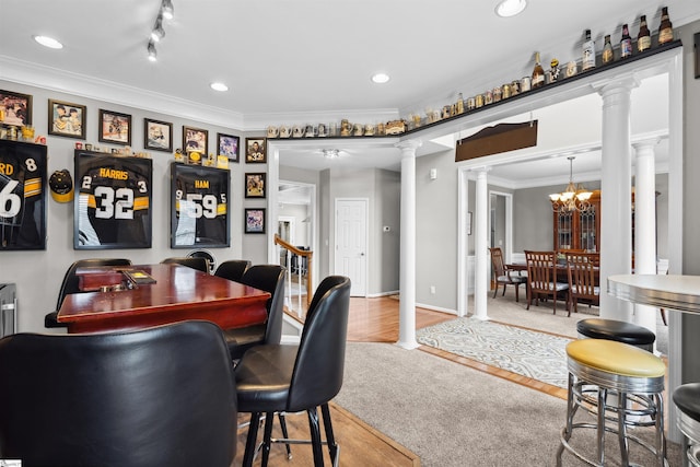 103 Hornbuckle Dr, Easley, SC 29642 - bar with a notable chandelier, recessed lighting, wood finished floors, ornate columns, and crown molding