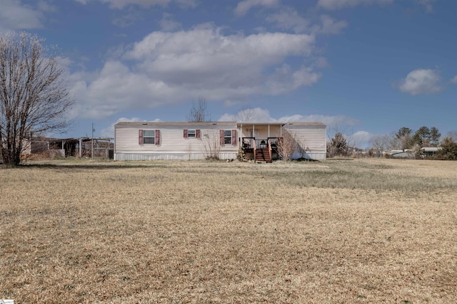 view of front of house with a front lawn