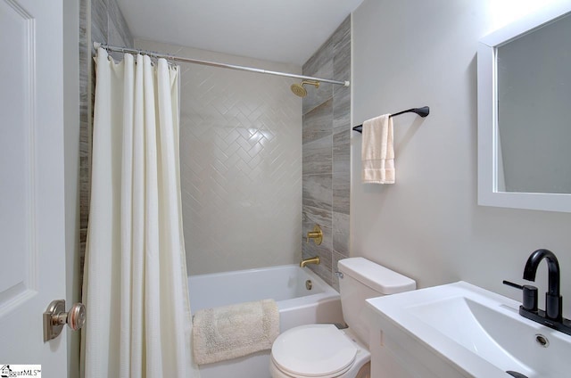 full bathroom featuring vanity, toilet, and shower / bath combo with shower curtain