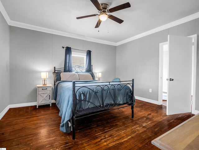 bedroom featuring ceiling fan, ornamental molding, hardwood / wood-style flooring, and baseboards