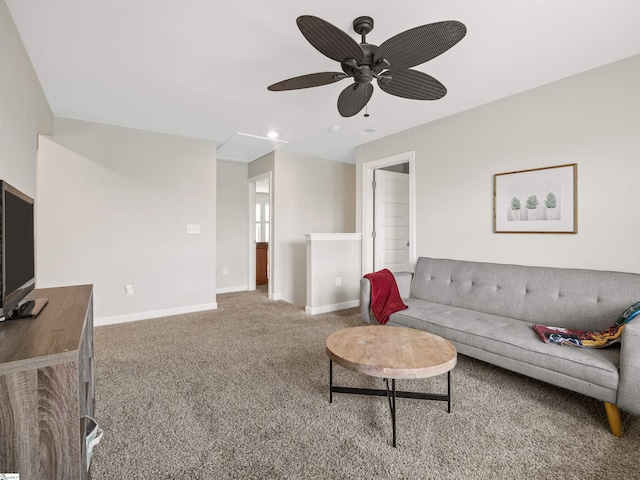 carpeted living area with recessed lighting, ceiling fan, and baseboards