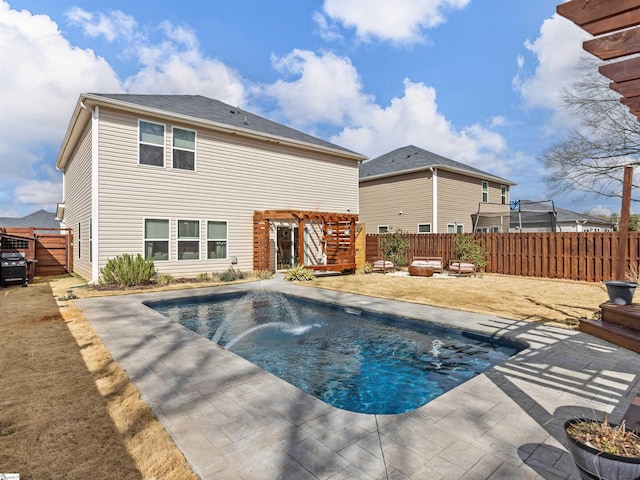 view of pool with a patio area and a fenced backyard