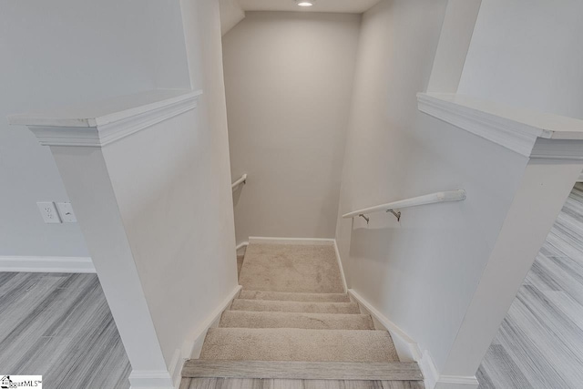 stairway with baseboards