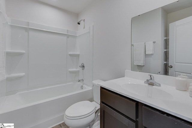 full bath with shower / bath combination, vanity, and toilet