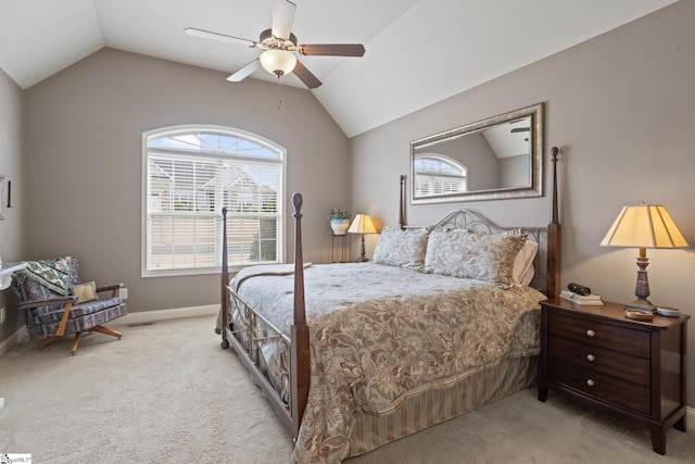 carpeted bedroom featuring vaulted ceiling, a ceiling fan, and baseboards