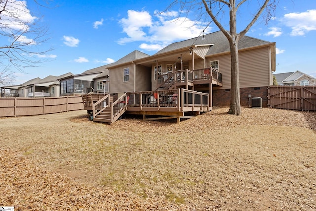 back of house featuring a deck, central AC, crawl space, and a fenced backyard