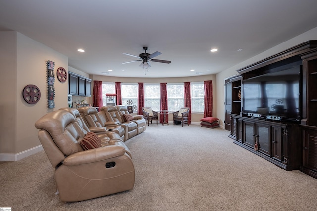 living area with a wealth of natural light, carpet flooring, and recessed lighting