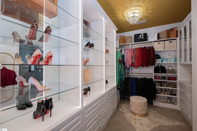 spacious closet with light carpet and visible vents