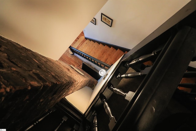 stairs with wood finished floors