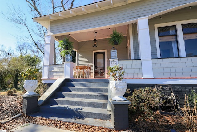 property entrance with a porch