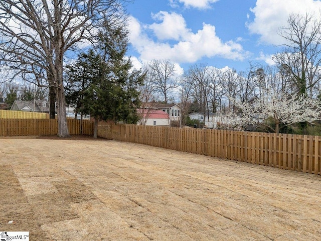 view of yard with fence