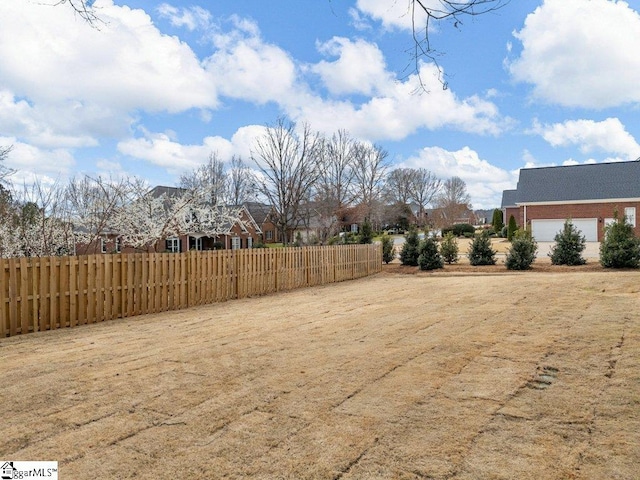 view of yard with fence