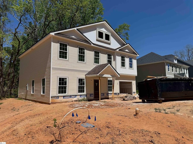 180 W Griffith St, Woodruff, SC 29388 - view of front facade featuring a garage and board and batten siding