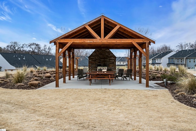 view of home's community with a patio area and a gazebo