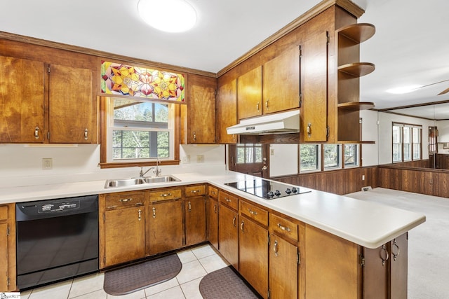 kitchen featuring open shelves, brown cabinetry, a peninsula, under cabinet range hood, and black appliances