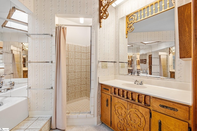 full bath featuring wallpapered walls, a shower stall, and vanity