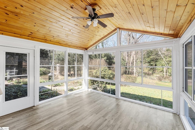 unfurnished sunroom featuring wood ceiling, vaulted ceiling, and ceiling fan