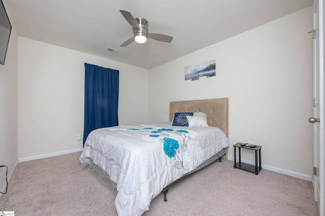 bedroom featuring ceiling fan, carpet floors, visible vents, and baseboards