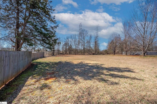 view of yard featuring fence