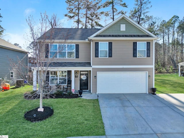 view of front facade featuring an attached garage, driveway, covered porch, and a front yard