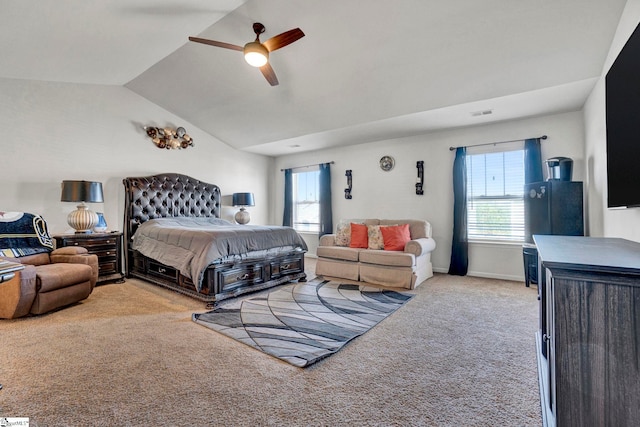 bedroom with lofted ceiling, visible vents, light carpet, ceiling fan, and baseboards