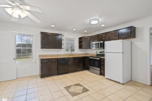 kitchen featuring crown molding, light tile patterned floors, open shelves, appliances with stainless steel finishes, and a sink