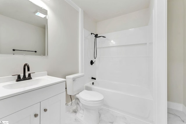 bathroom with baseboards, bathing tub / shower combination, toilet, marble finish floor, and vanity