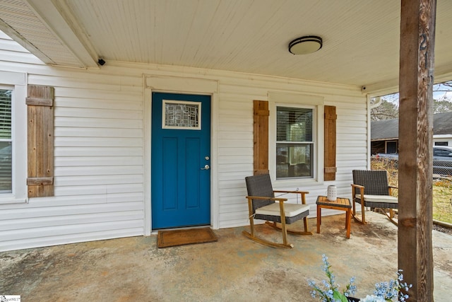 entrance to property with a porch