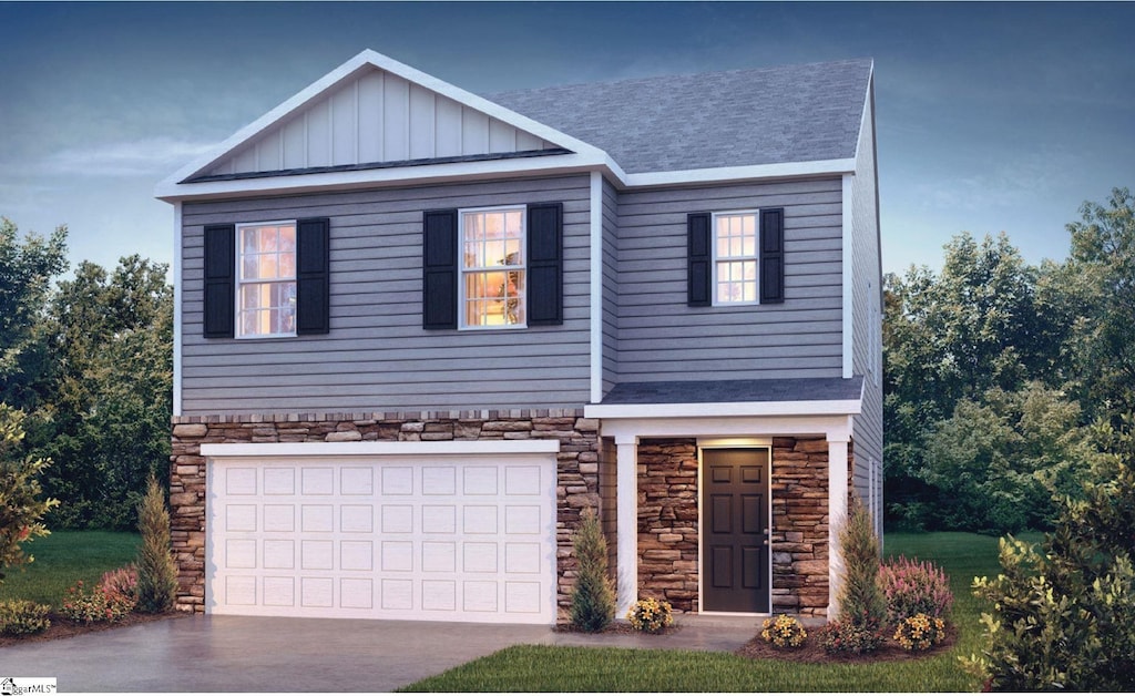 view of front of property featuring driveway, stone siding, an attached garage, and board and batten siding