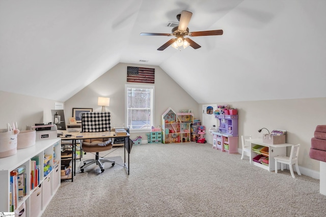 carpeted home office with lofted ceiling, ceiling fan, visible vents, and baseboards