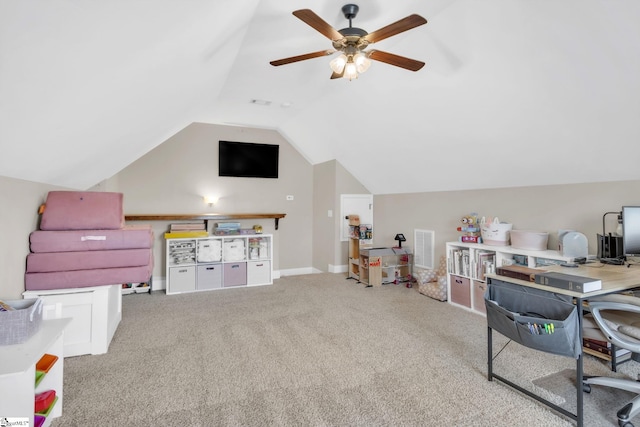 rec room featuring carpet flooring, visible vents, baseboards, vaulted ceiling, and a ceiling fan