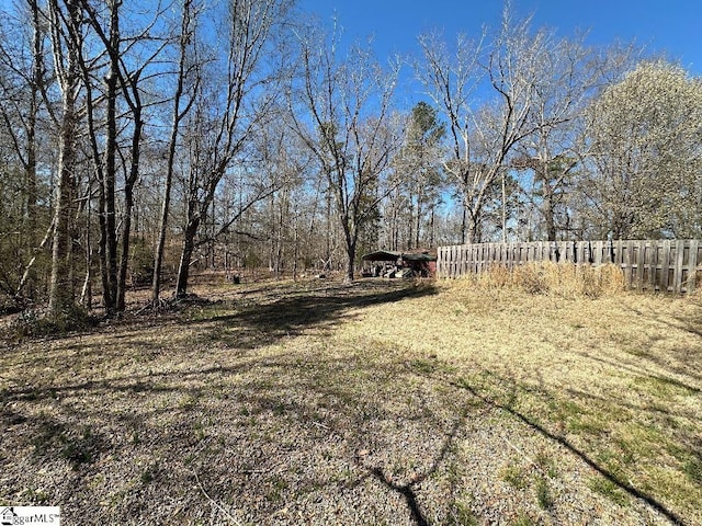 view of yard featuring fence