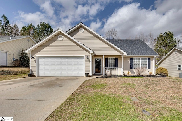 ranch-style home featuring a front lawn, concrete driveway, covered porch, and an attached garage