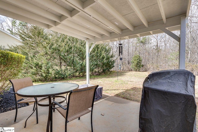 view of patio / terrace with a grill and outdoor dining area