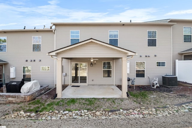 back of house with ceiling fan, a patio, central AC unit, and fence