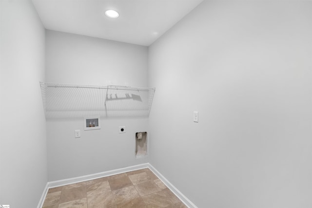 clothes washing area with laundry area, hookup for a washing machine, electric dryer hookup, and baseboards