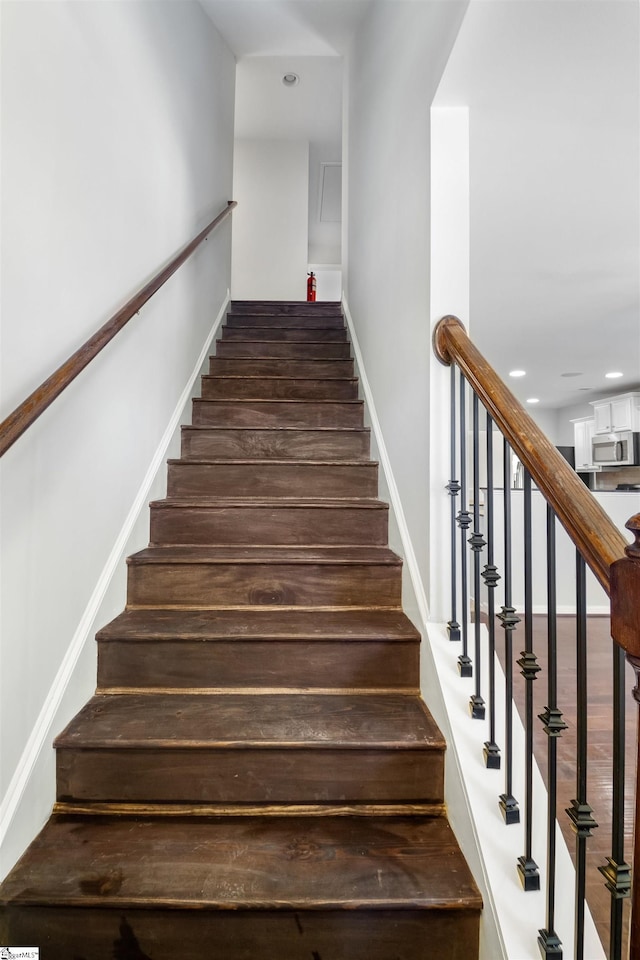 staircase with baseboards