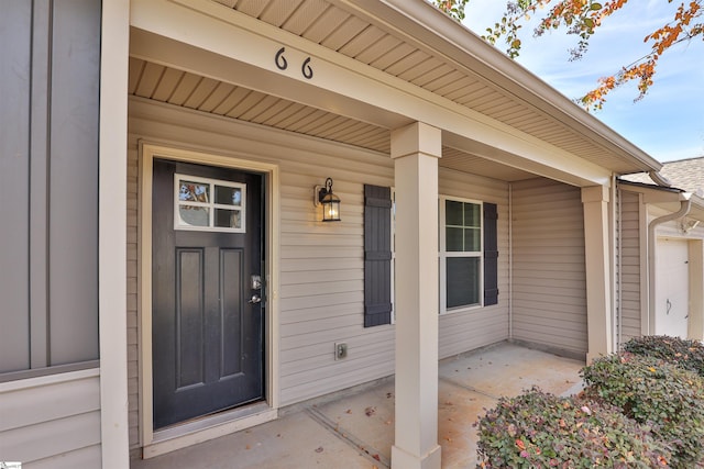 doorway to property featuring a porch