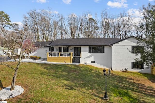 ranch-style home featuring crawl space, a porch, a front lawn, and stucco siding