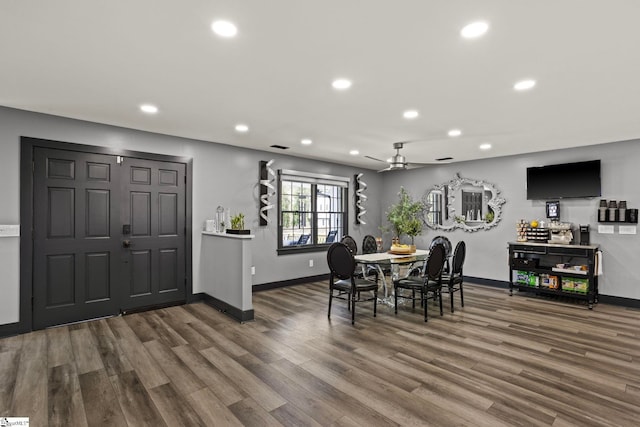 dining area with a ceiling fan, recessed lighting, baseboards, and wood finished floors