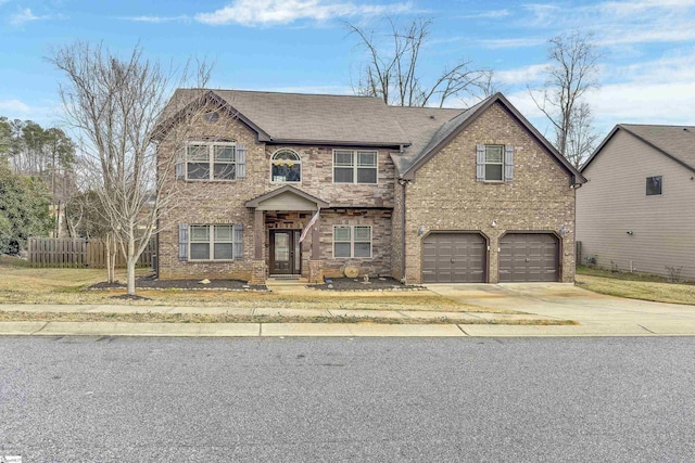 view of front of property with brick siding, a shingled roof, concrete driveway, fence, and a garage